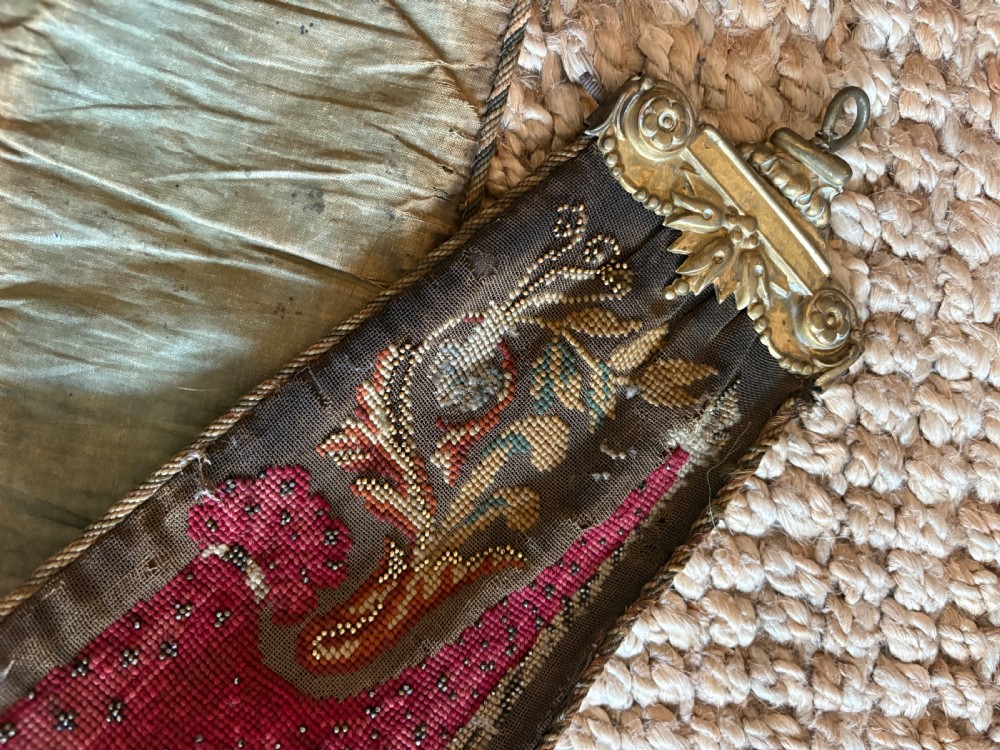 A long 19th-century hand-embroidered silk and beadwork bell pull featuring floral designs and cast brass end fittings with a lower ring. View XIII