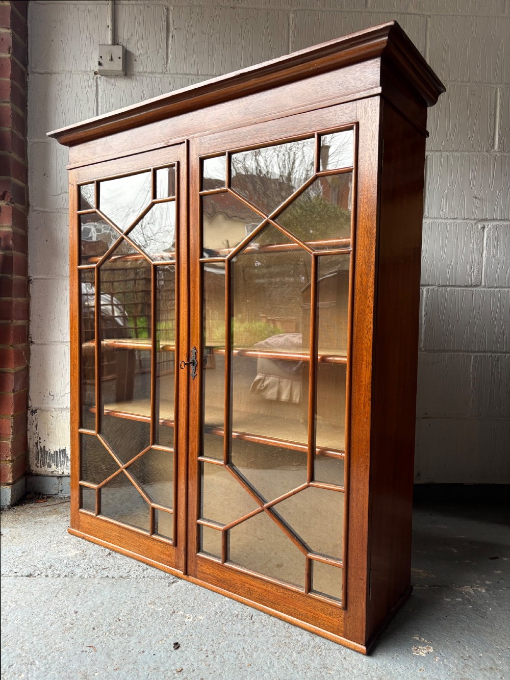 Wall Mounted Astral Glaze Mahogany Bookcase Cabinet, Linen Lined 100cm wide, C1900 View VIII