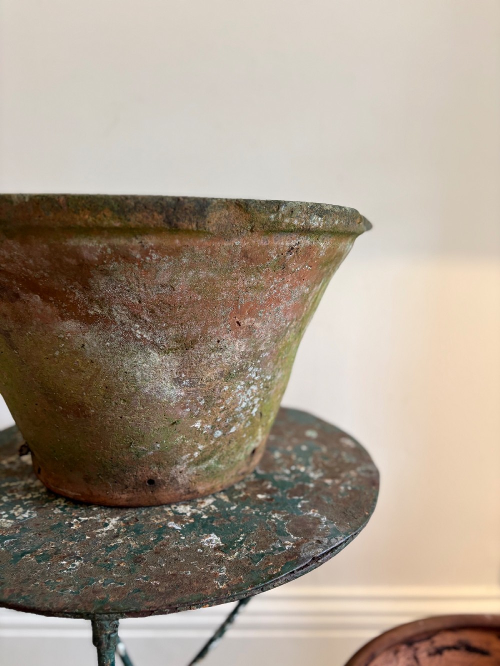 A large 19th-century circular terracotta dairy bowl featuring a dark glazed interior and weathered, unglazed exterior surface. View VIII