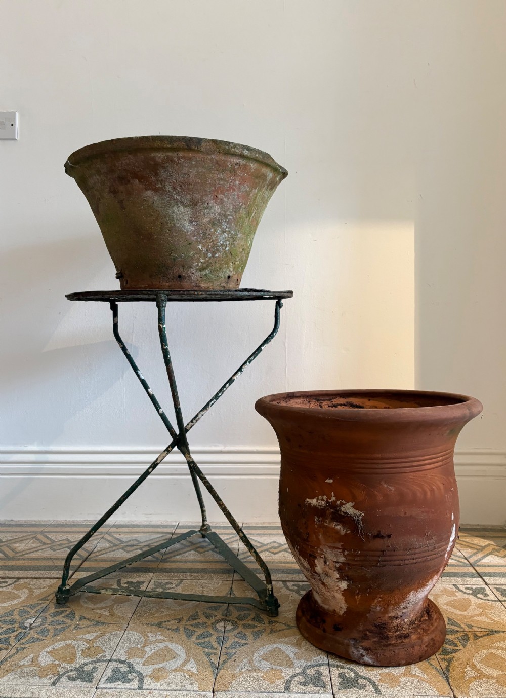 A large 19th-century circular terracotta dairy bowl featuring a dark glazed interior and weathered, unglazed exterior surface. View XI