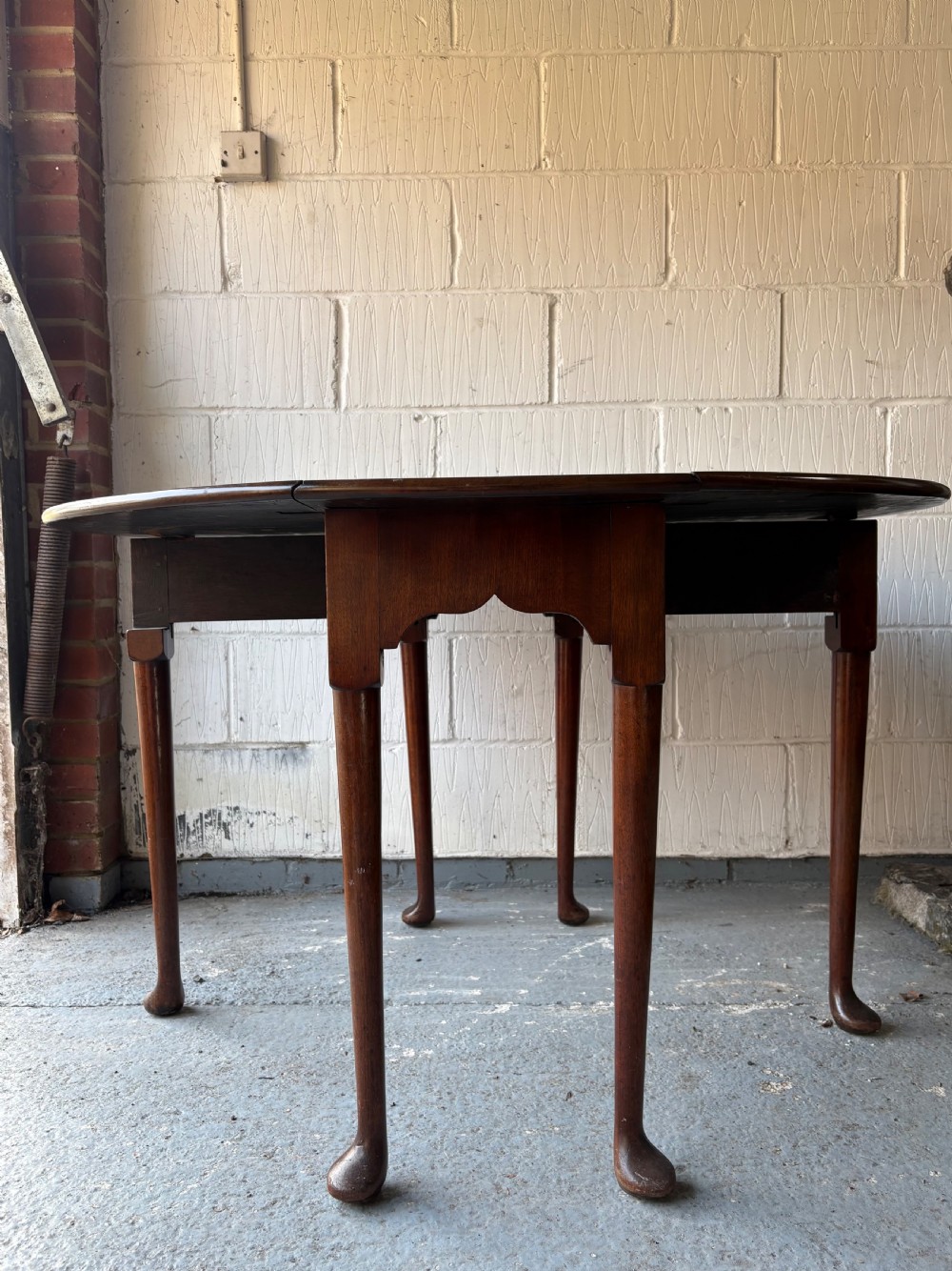 A 19th Century Mahogany Oval Drop Leaf Breakfast Dining Table, Pad Feet View VIII