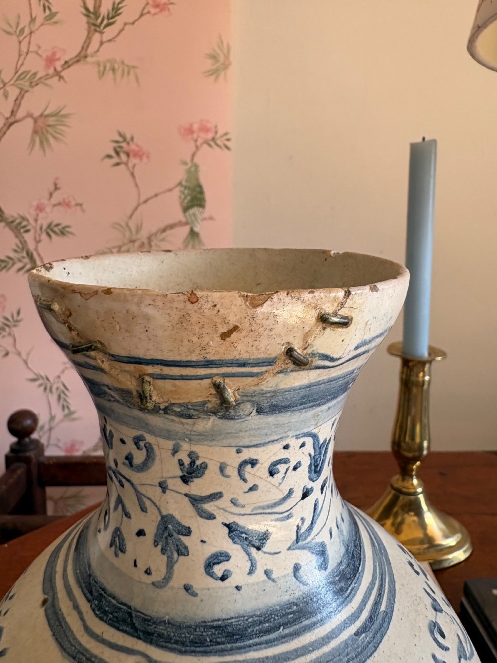 An 18th to 19th century Italian blue and white tin-glazed earthenware apothecary jar featuring painted foliate borders and the Latin inscription CARDO SANT. View VI