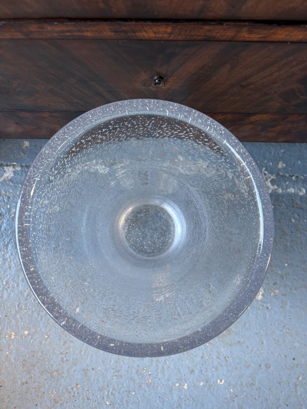 A tall flared Art Deco clear crystal vase featuring a densely bubble-textured interior. View IV