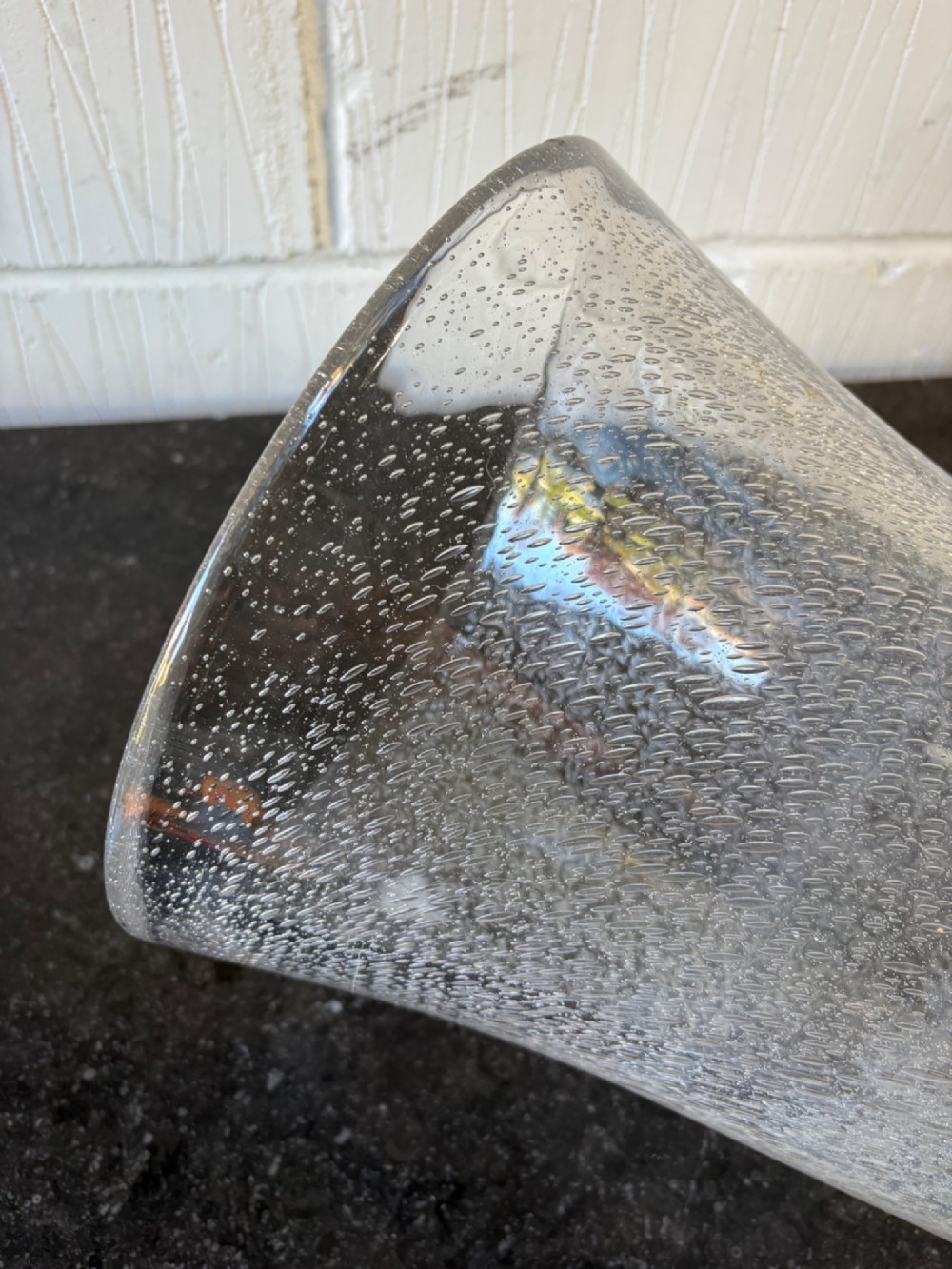 A tall flared Art Deco clear crystal vase featuring a densely bubble-textured interior. View V
