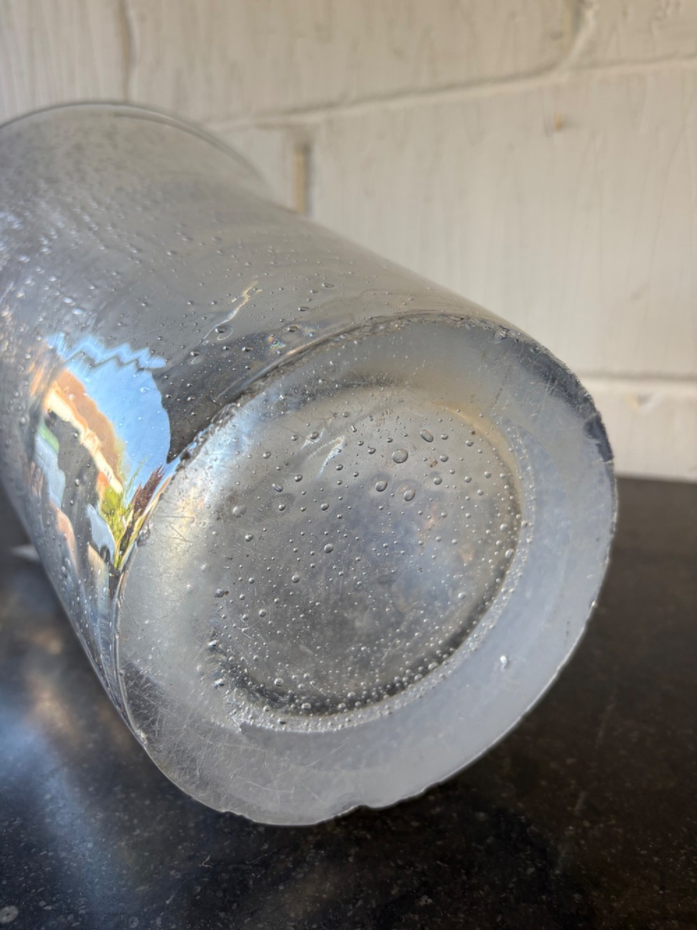 A tall flared Art Deco clear crystal vase featuring a densely bubble-textured interior. View VIII