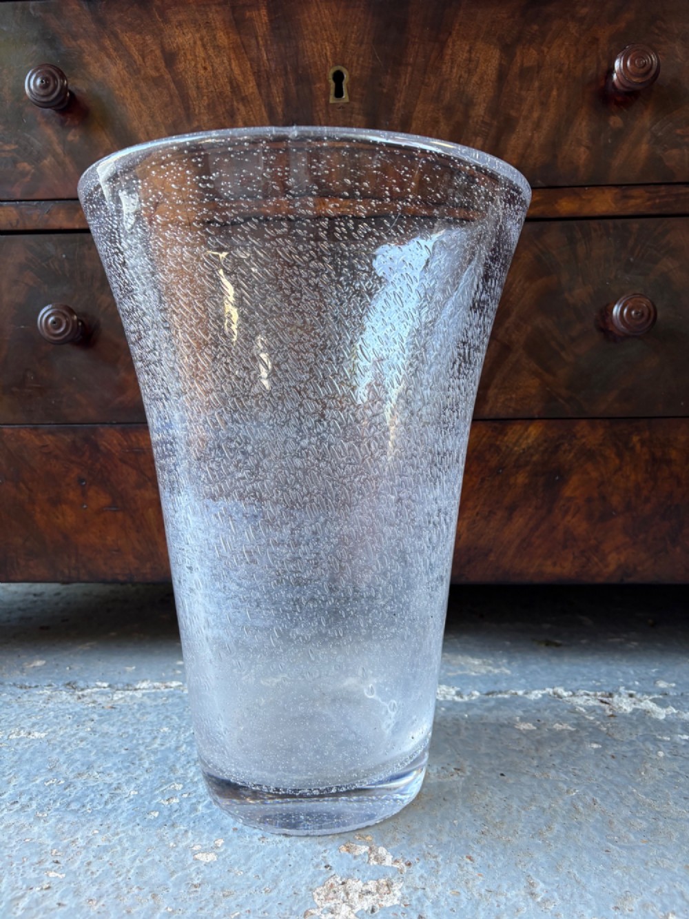 A tall flared Art Deco clear crystal vase featuring a densely bubble-textured interior. View IX