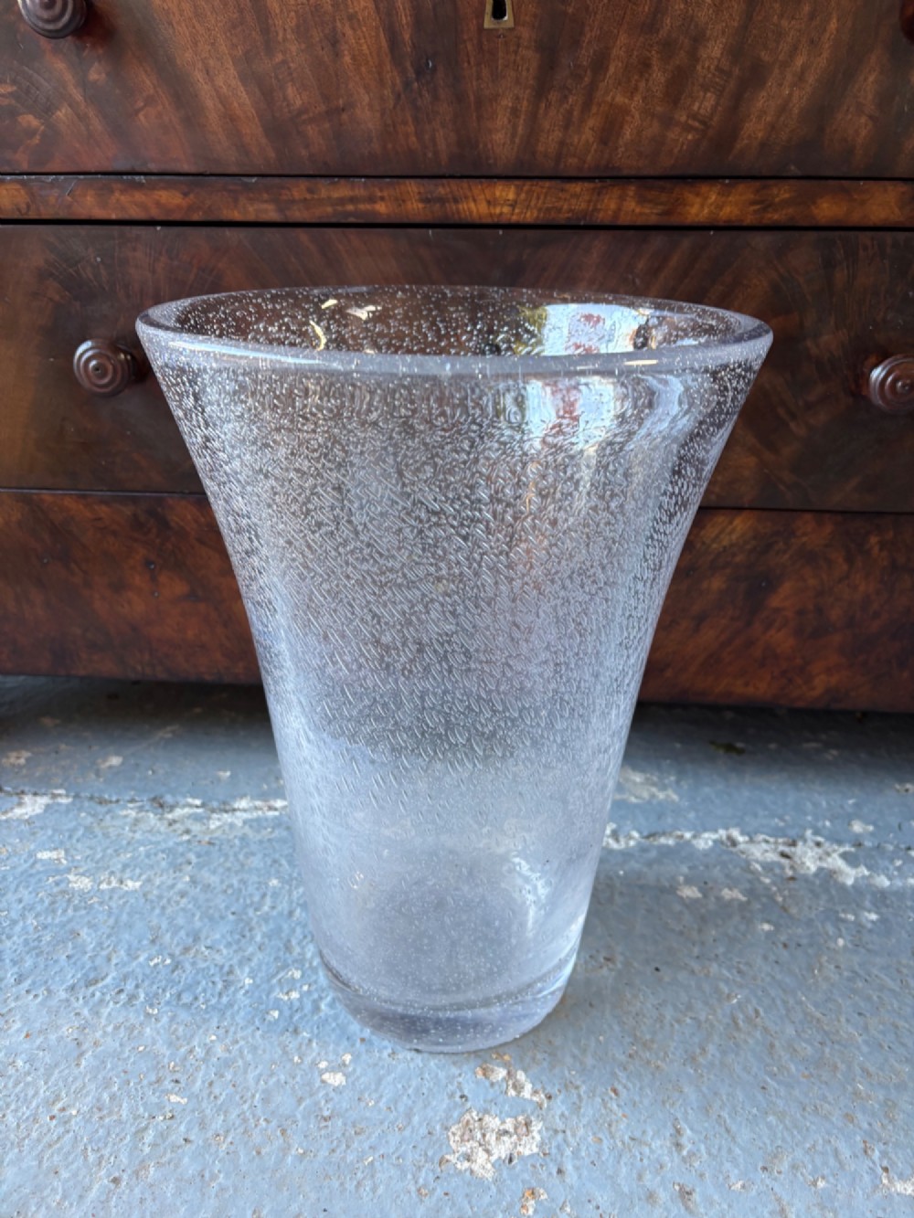 A tall flared Art Deco clear crystal vase featuring a densely bubble-textured interior. View X