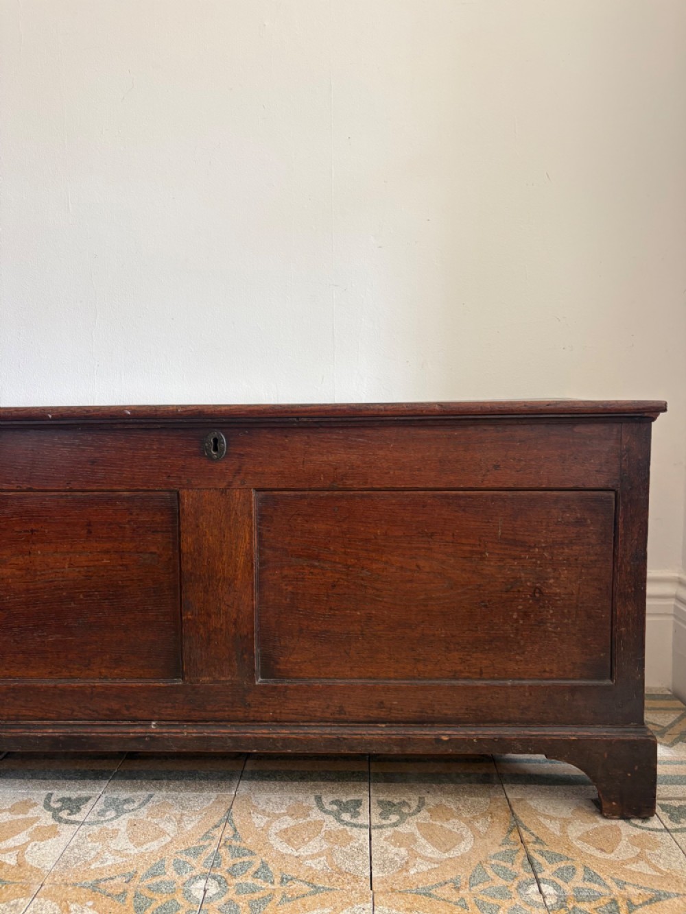 A Georgian Oak Blanket Box 123cm with Iron Hinged Lid, on Bracket Feet C1790 View III