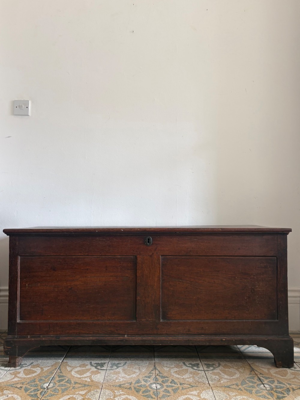 A Georgian Oak Blanket Box 123cm with Iron Hinged Lid, on Bracket Feet C1790