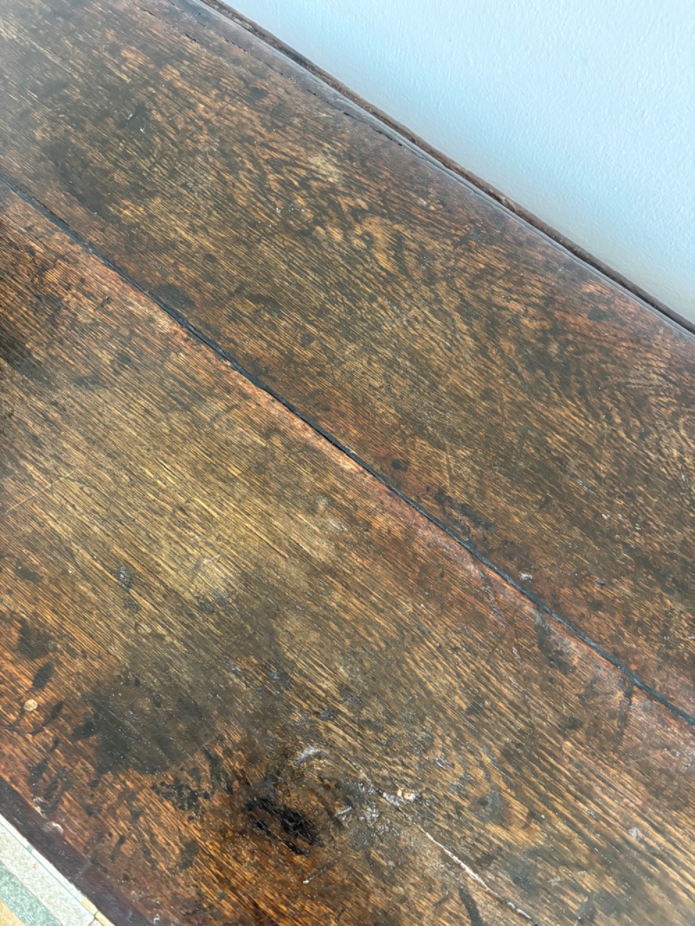 A dark oak gateleg table with a drop-leaf plank top and turned baluster legs joined by low stretchers. View IV