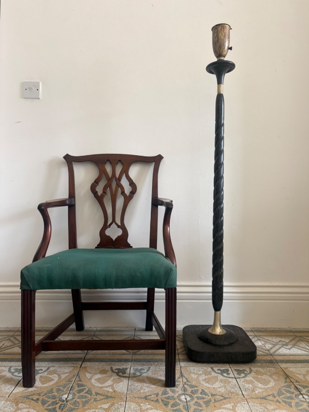 A French 1920s ebonised floor lamp featuring a carved barley twist column on a square base with a brass socket fitting. View III