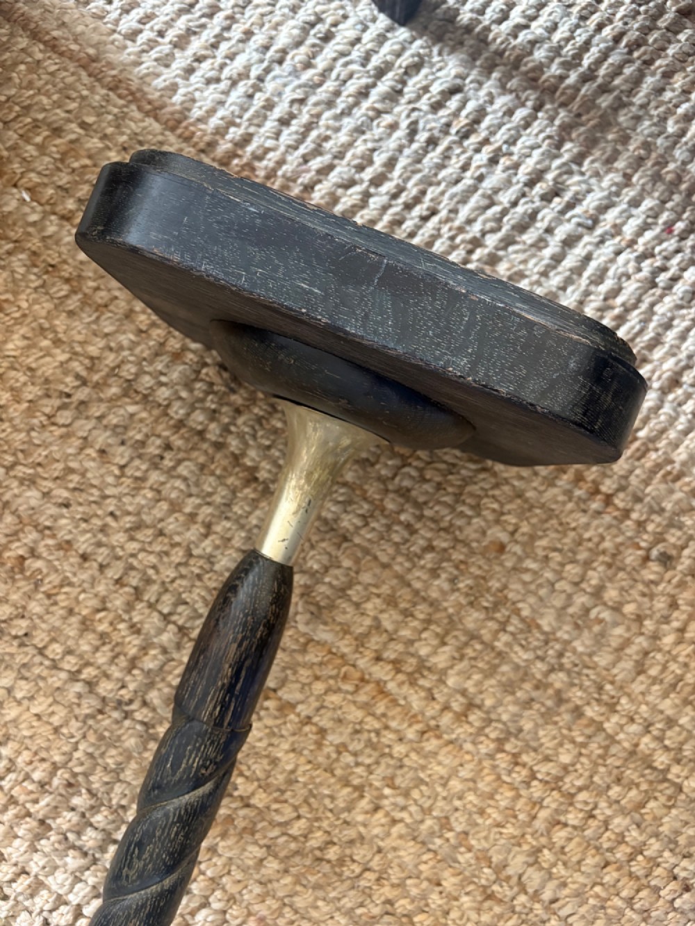 A French 1920s ebonised floor lamp featuring a carved barley twist column on a square base with a brass socket fitting. View IX