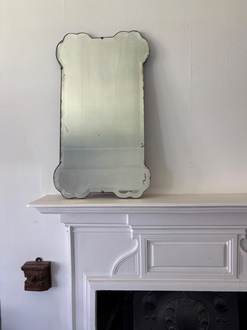 A Shapely 1920s Bevelled Frameless Art Deco Mirror, 69cm tall, Gently Foxed Plate
