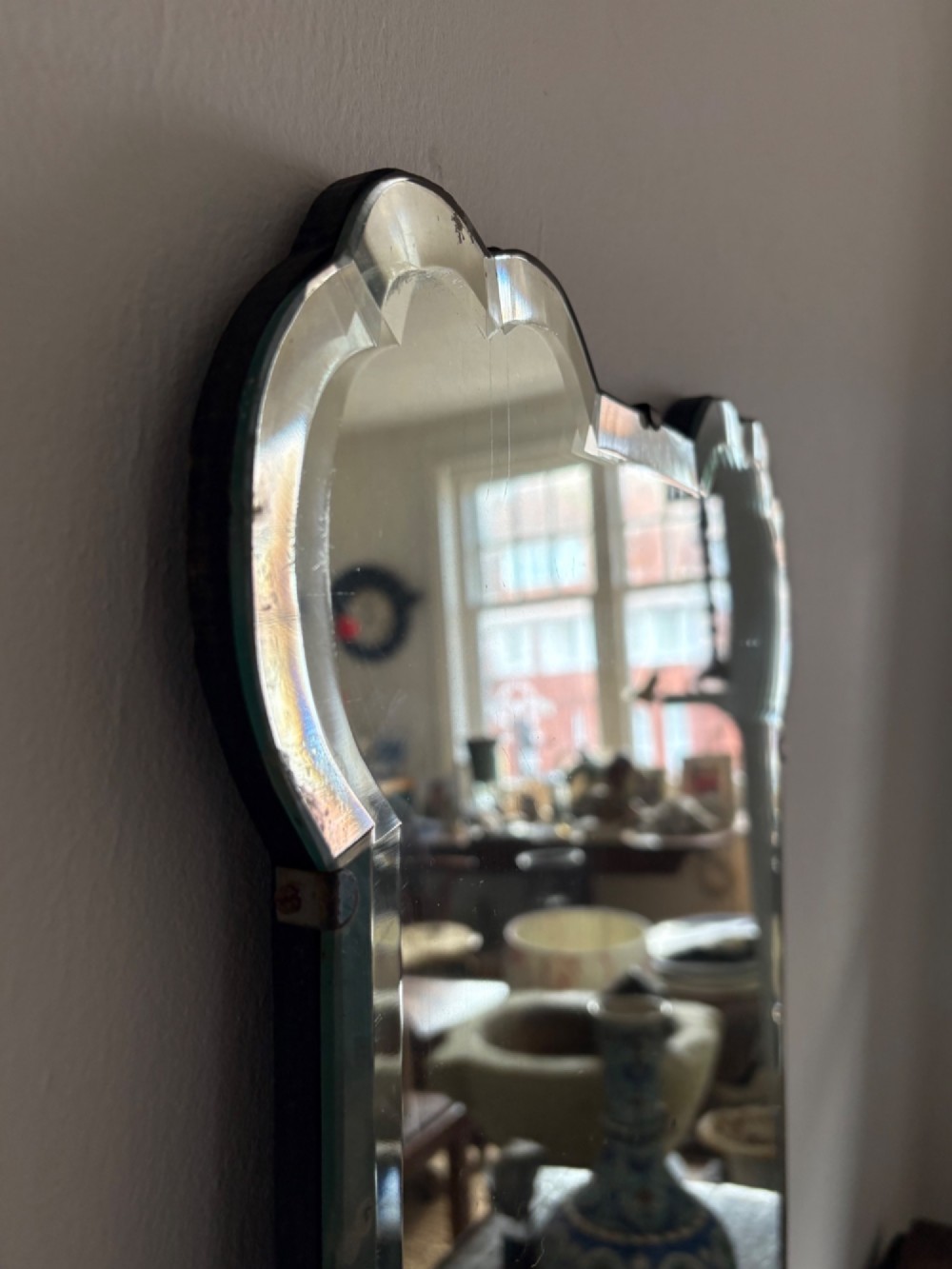 A Shapely 1920s Bevelled Frameless Art Deco Mirror, 69cm tall, Gently Foxed Plate View VII