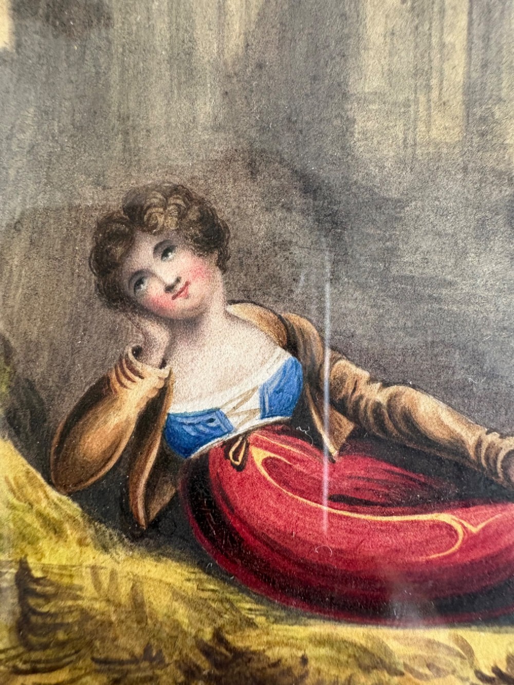 A 19th-century watercolour painting depicting a reclining figure in a landscape with ruins, set inside a broad giltwood frame. View VIII