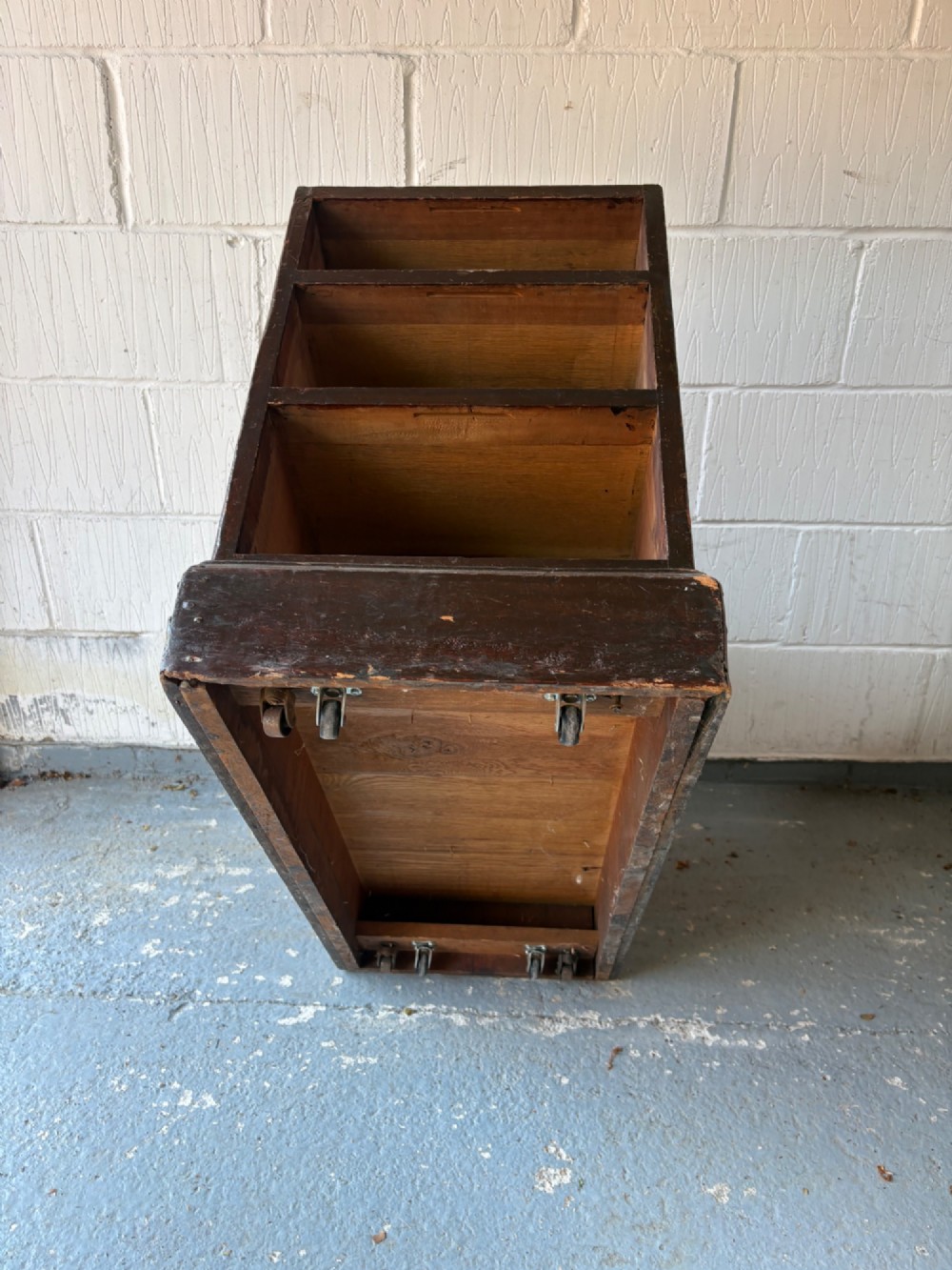 An antique dark mahogany pedestal desk featuring a green leather inset writing top, nine drawers with brass swan-neck handles, and twin pedestals on plinth bases. View V