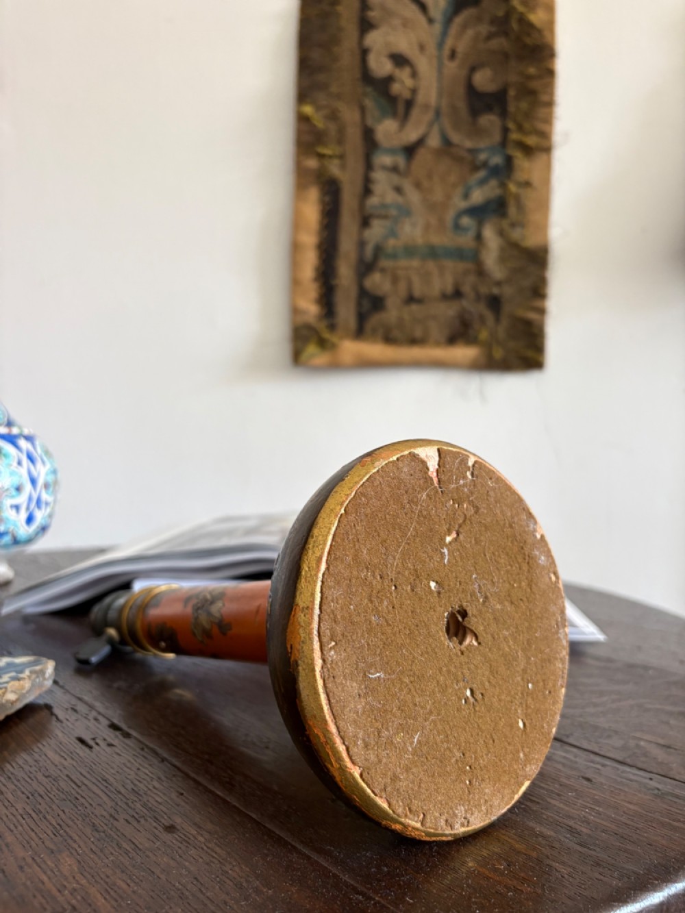 A mandarin orange lacquered table lamp base decorated with gold hand-painted floral motifs and fitted with a brass bulb holder. View IV