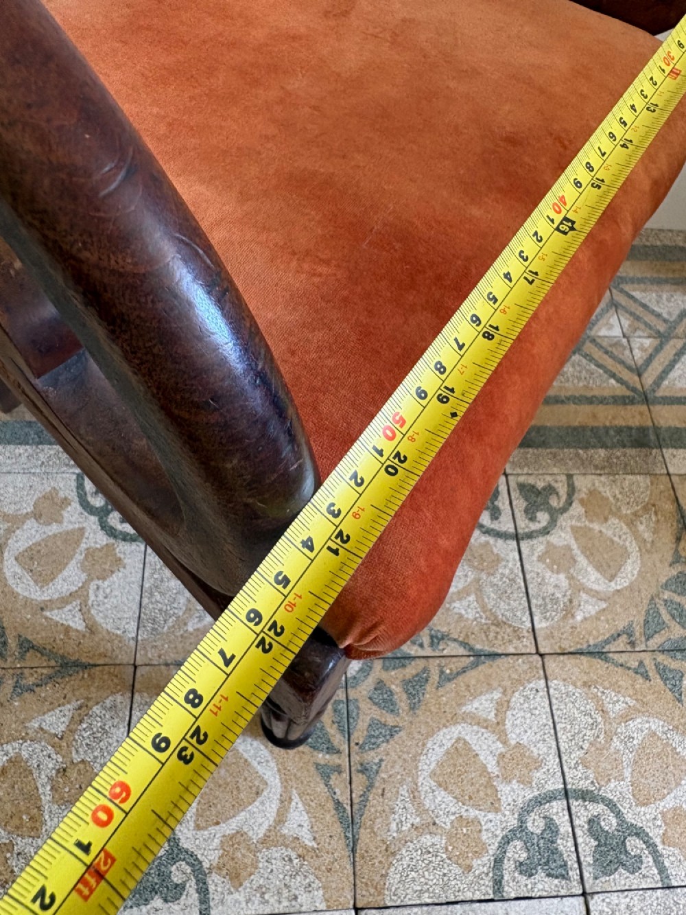 Profile view of a Late Regency mahogany open armchair with scrolled armrests, reeded front legs, and a rust orange velvet drop-in seat. View XII