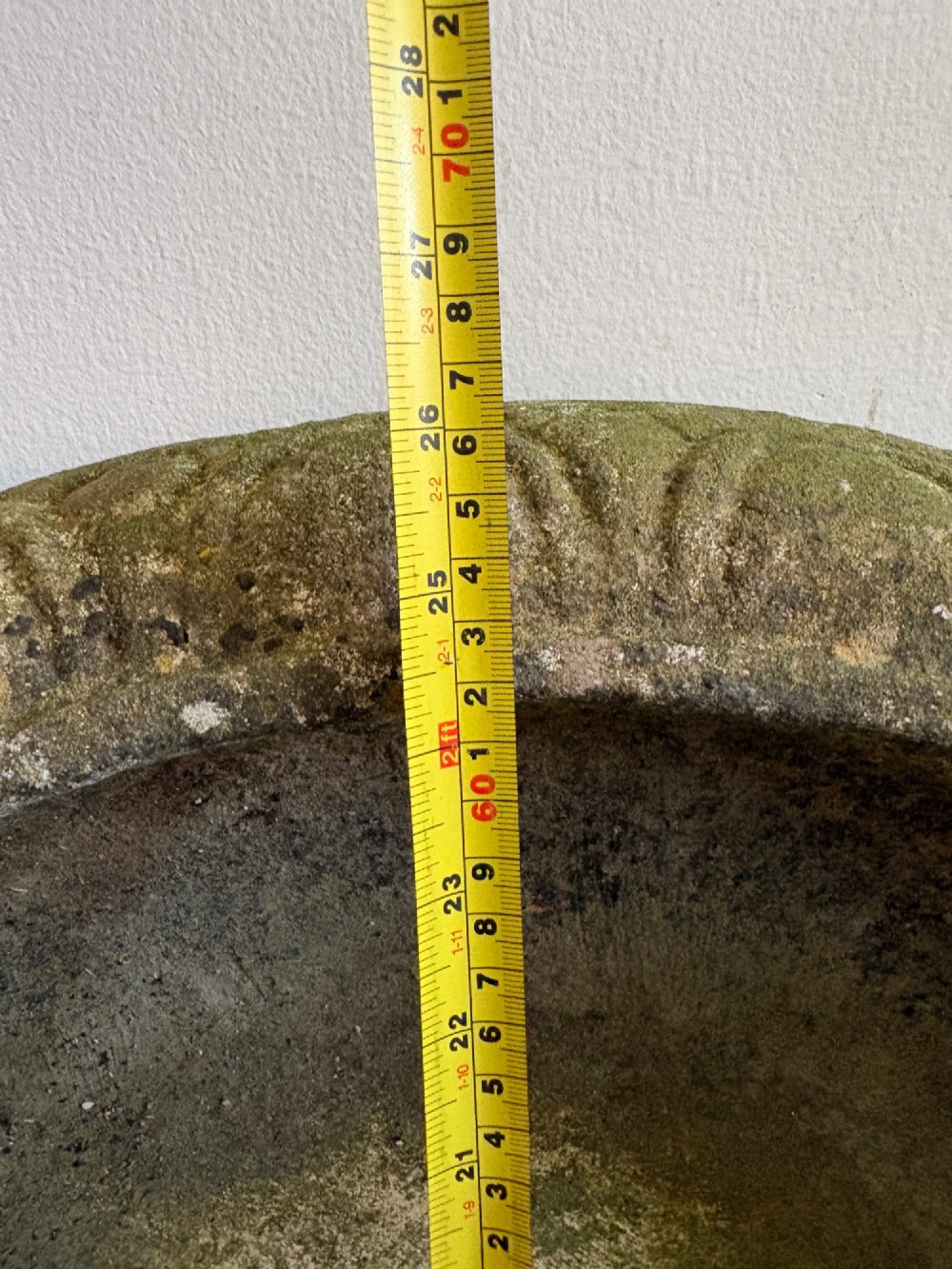 A shallow Neoclassical cast stone birdbath planter with a low moulded pedestal base, displaying a weathered grey and green patinated surface. View XIII