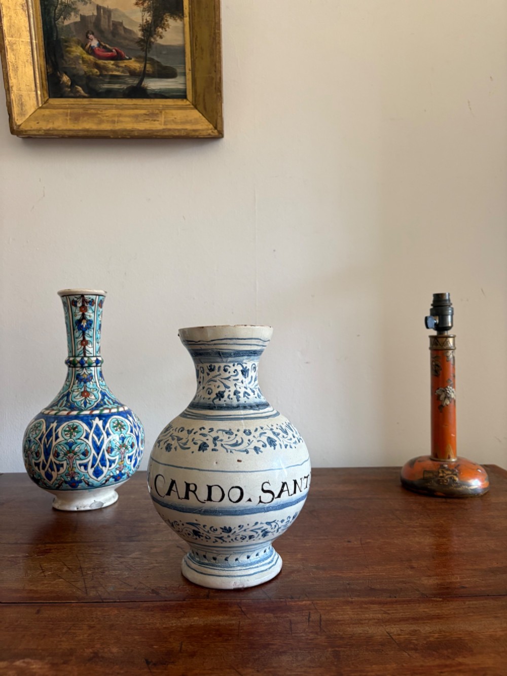 An 18th to 19th century Italian blue and white tin-glazed earthenware apothecary jar featuring painted foliate borders and the Latin inscription CARDO SANT. View XV