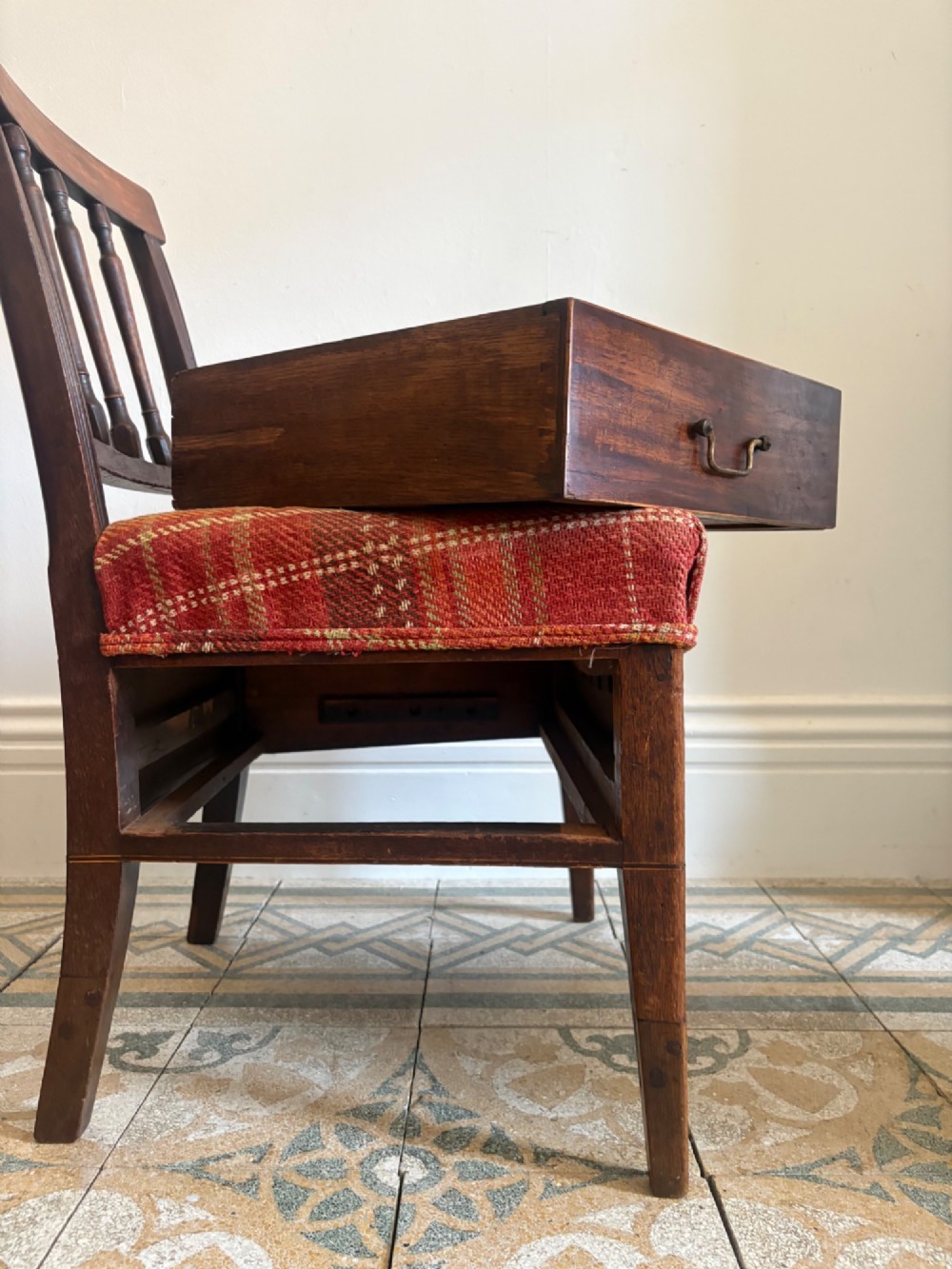 A Regency mahogany and beech side chair featuring a red plaid upholstered seat above an integrated wooden drawer with a brass drop handle. View III