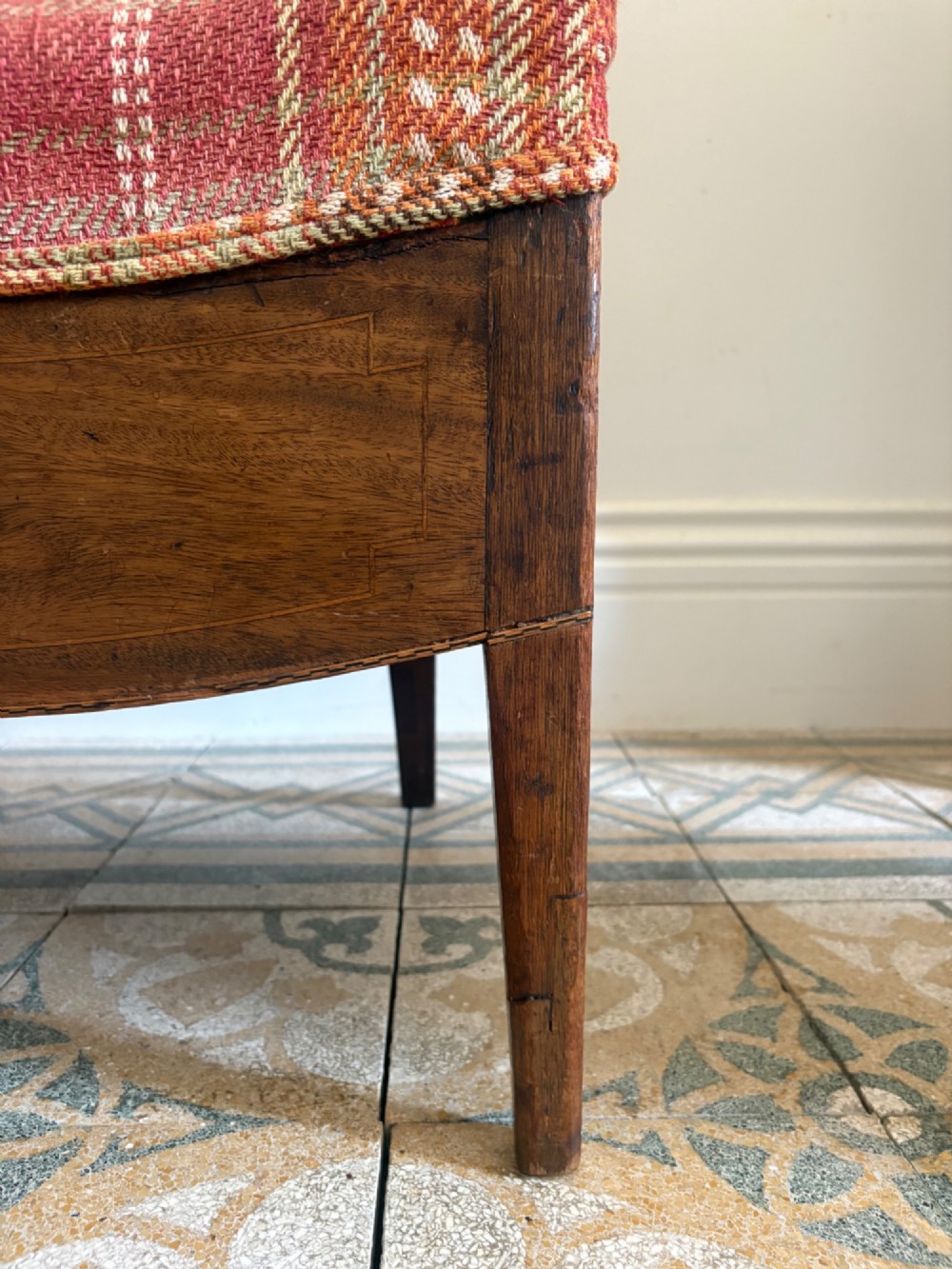 A Regency mahogany and beech side chair featuring a red plaid upholstered seat above an integrated wooden drawer with a brass drop handle. View VII