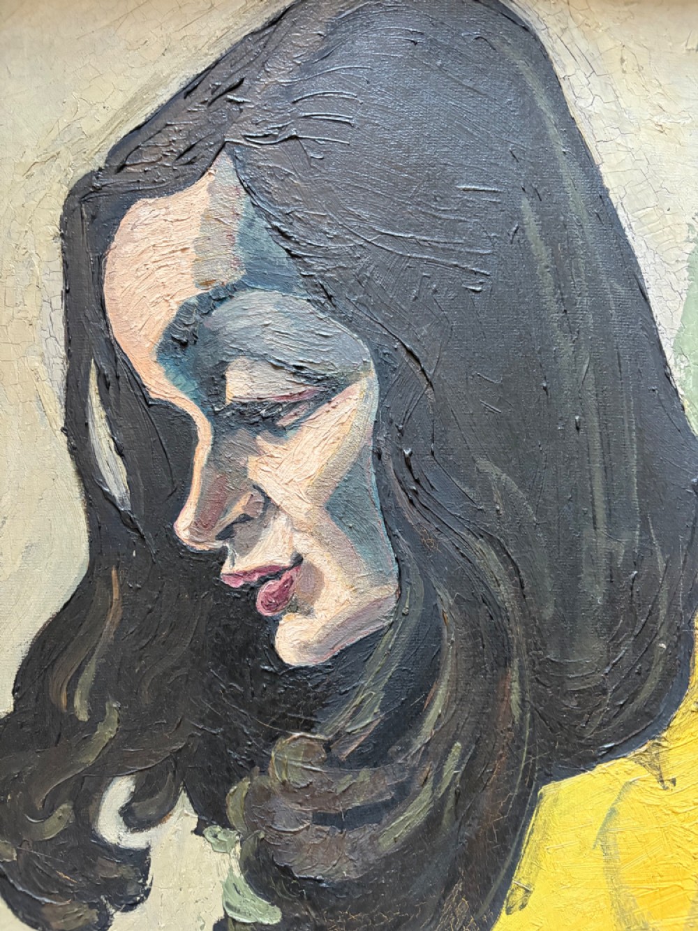 A framed 1930s German Expressionist oil painting on panel depicting a dark-haired woman in profile wearing a yellow top. View III