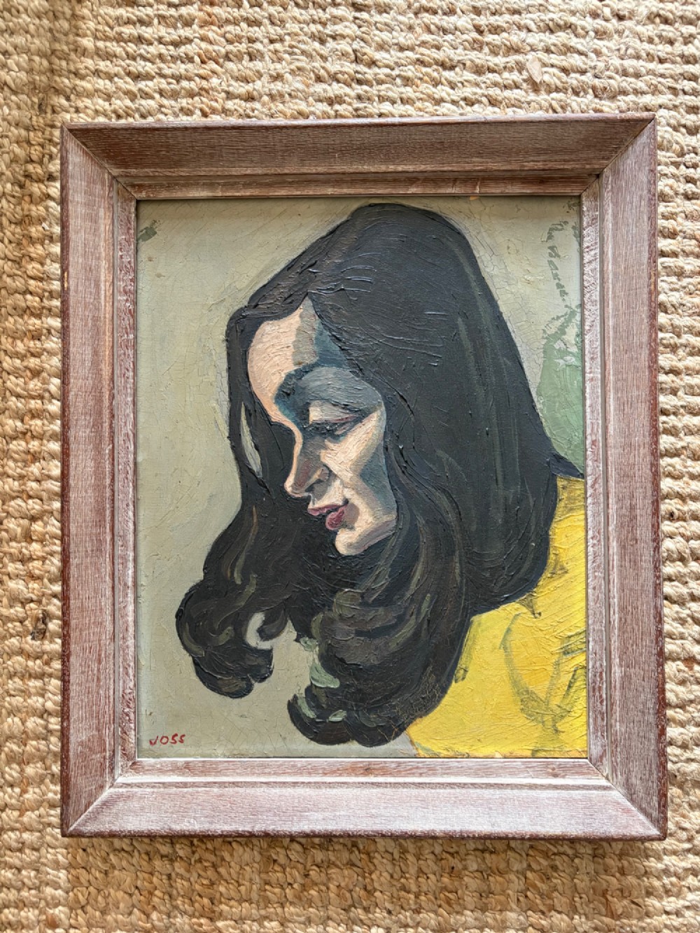A framed 1930s German Expressionist oil painting on panel depicting a dark-haired woman in profile wearing a yellow top. View VI