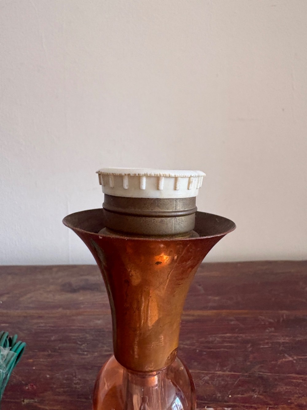 A small French Art Deco table lamp featuring a spherical white opaline glass shade atop a turned copper stem mounted on a square veined marble base. View IV