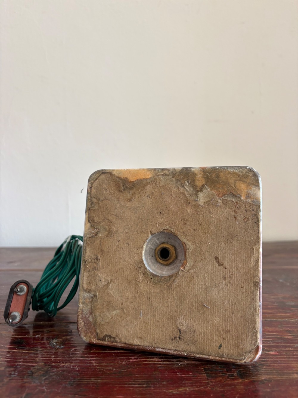 A small French Art Deco table lamp featuring a spherical white opaline glass shade atop a turned copper stem mounted on a square veined marble base. View X