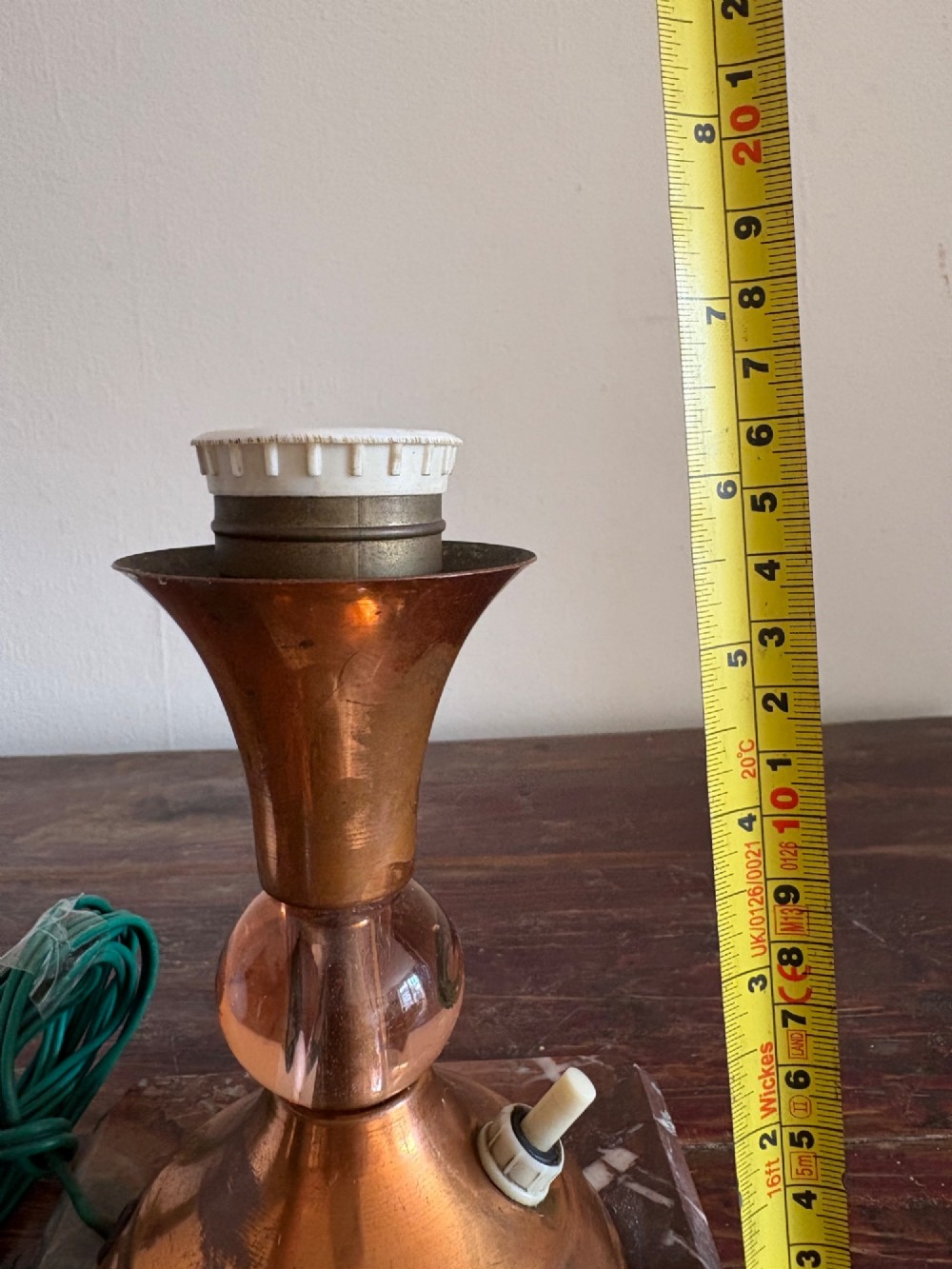 A small French Art Deco table lamp featuring a spherical white opaline glass shade atop a turned copper stem mounted on a square veined marble base. View XIII