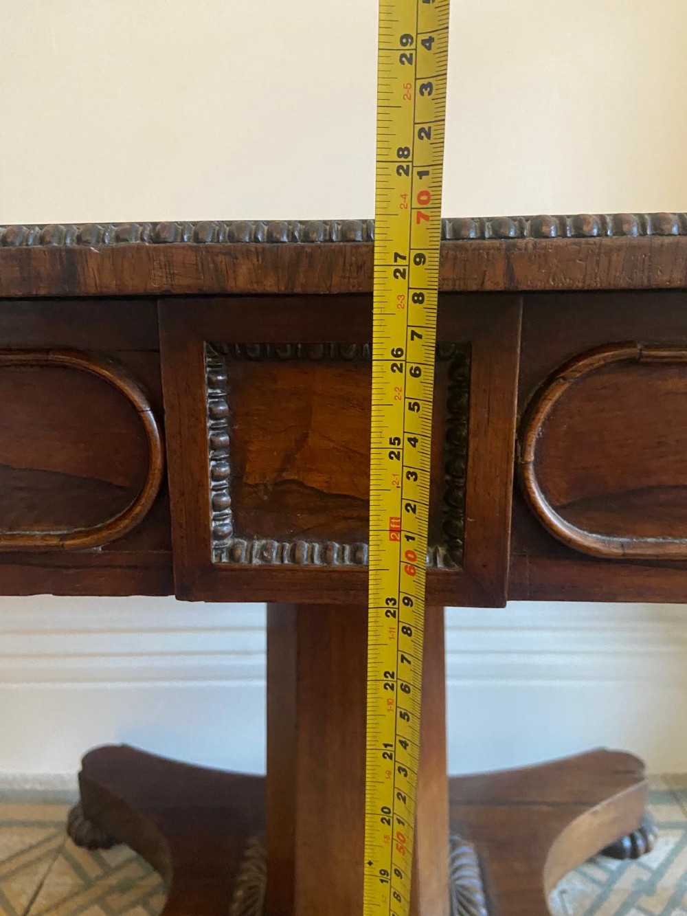 A Regency rosewood sofa table featuring two drop leaves, twin frieze drawers, a central pedestal column, and a quadform base with claw feet. View V