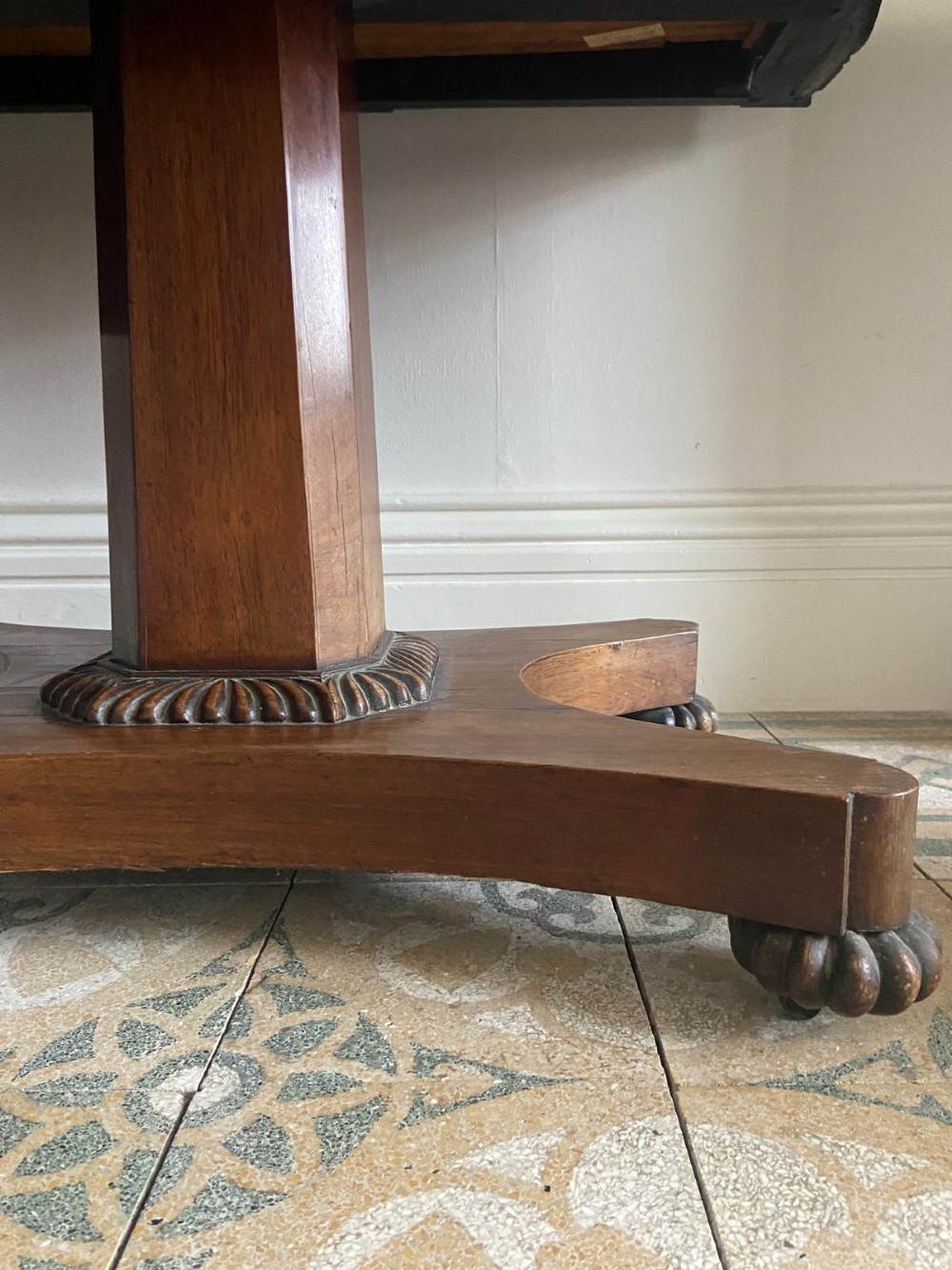 A Regency rosewood sofa table featuring two drop leaves, twin frieze drawers, a central pedestal column, and a quadform base with claw feet. View XIV