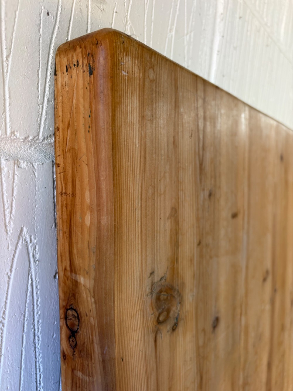 An Edwardian rectangular pine farmhouse kitchen table featuring turned elm legs and a thick wooden top. View VI