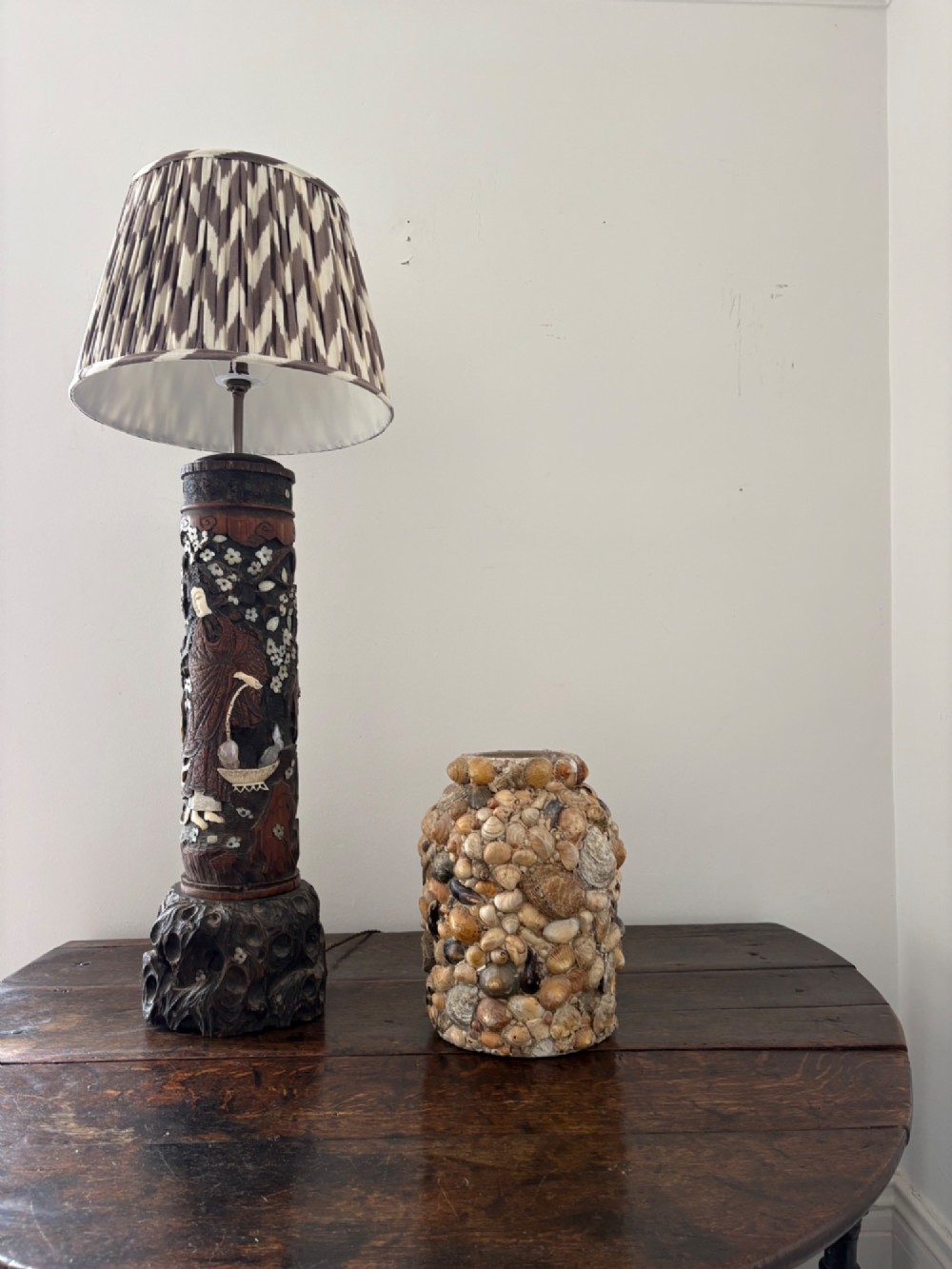 A tall Japanese Meiji period carved wooden brush pot converted into a table lamp with mother-of-pearl details and a patterned pleated lampshade. View XII
