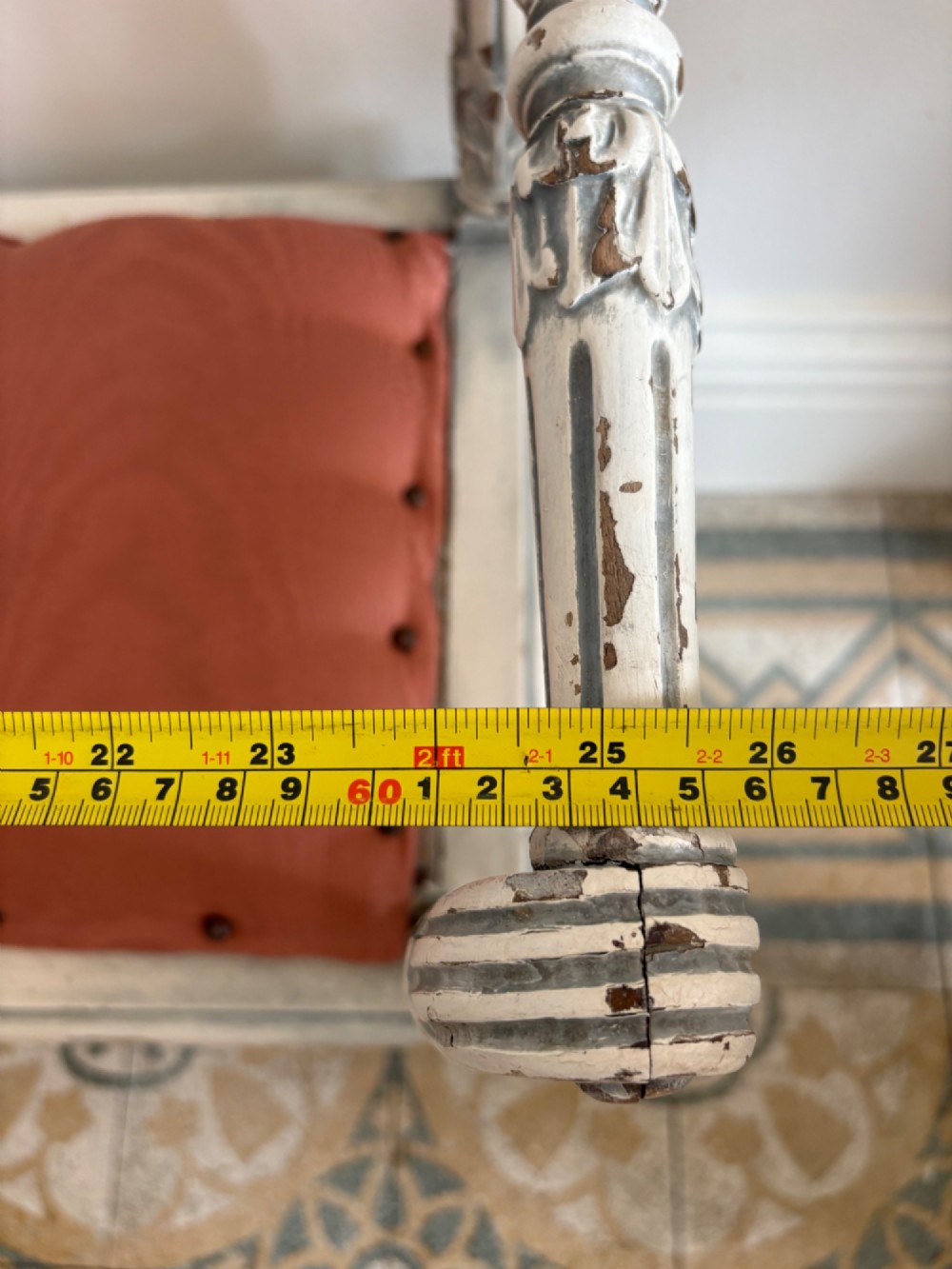 A white painted Gustavian style stool featuring raised side handles, fluted legs, and a terracotta silk upholstered seat. View XV