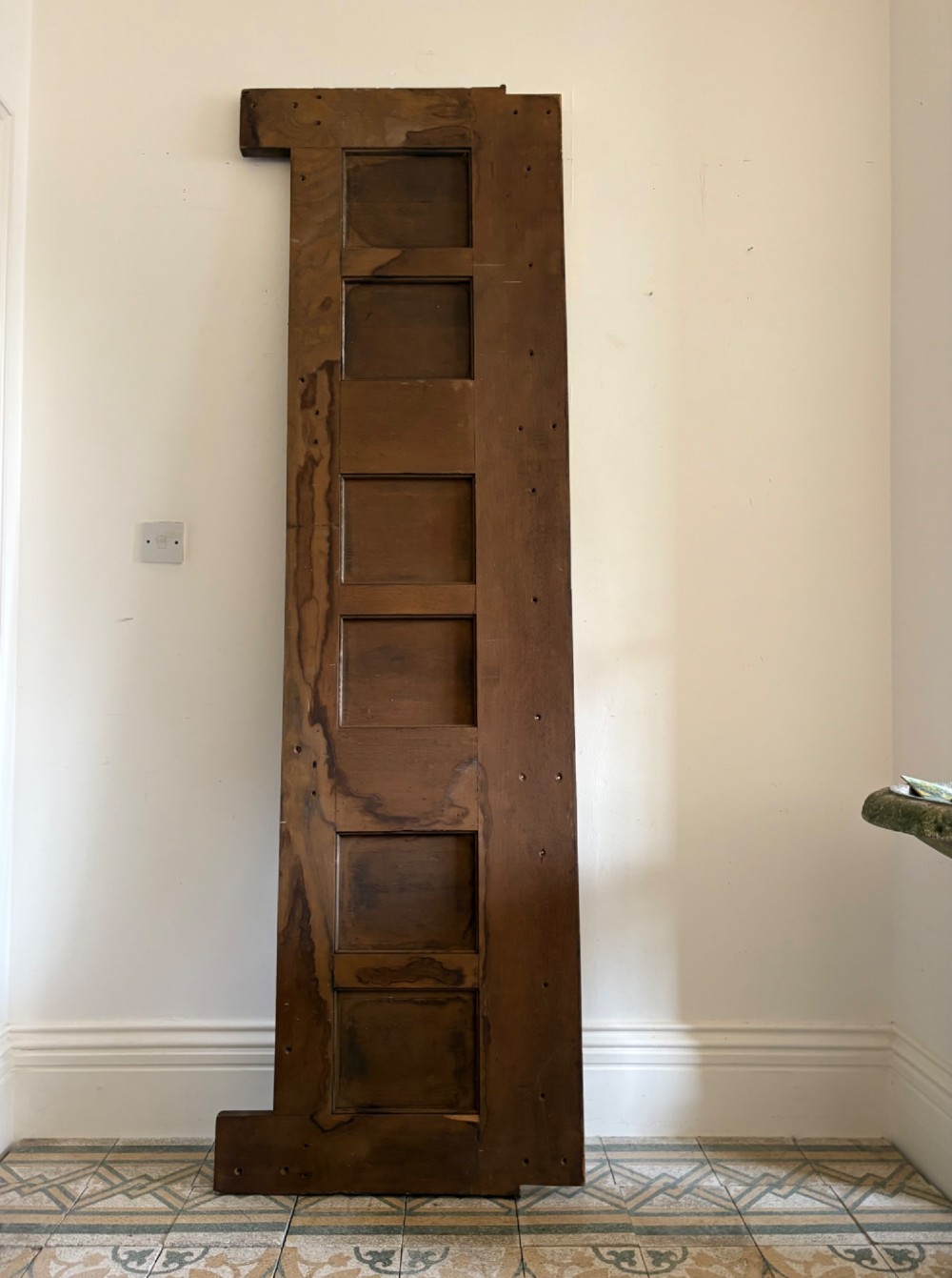 A tall nineteenth-century dark oak architectural panel featuring six vertically arranged carved gothic arches with fan motifs. View VI