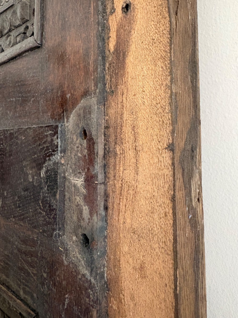 A tall nineteenth-century dark oak architectural panel featuring six vertically arranged carved gothic arches with fan motifs. View VII