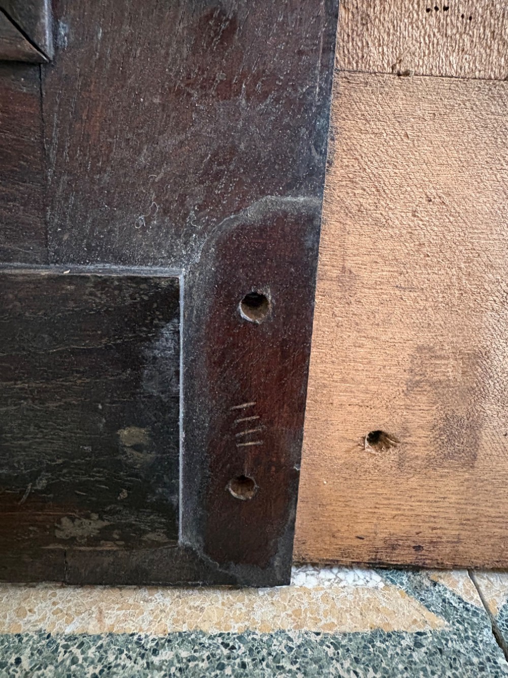 A tall nineteenth-century dark oak architectural panel featuring six vertically arranged carved gothic arches with fan motifs. View VIII