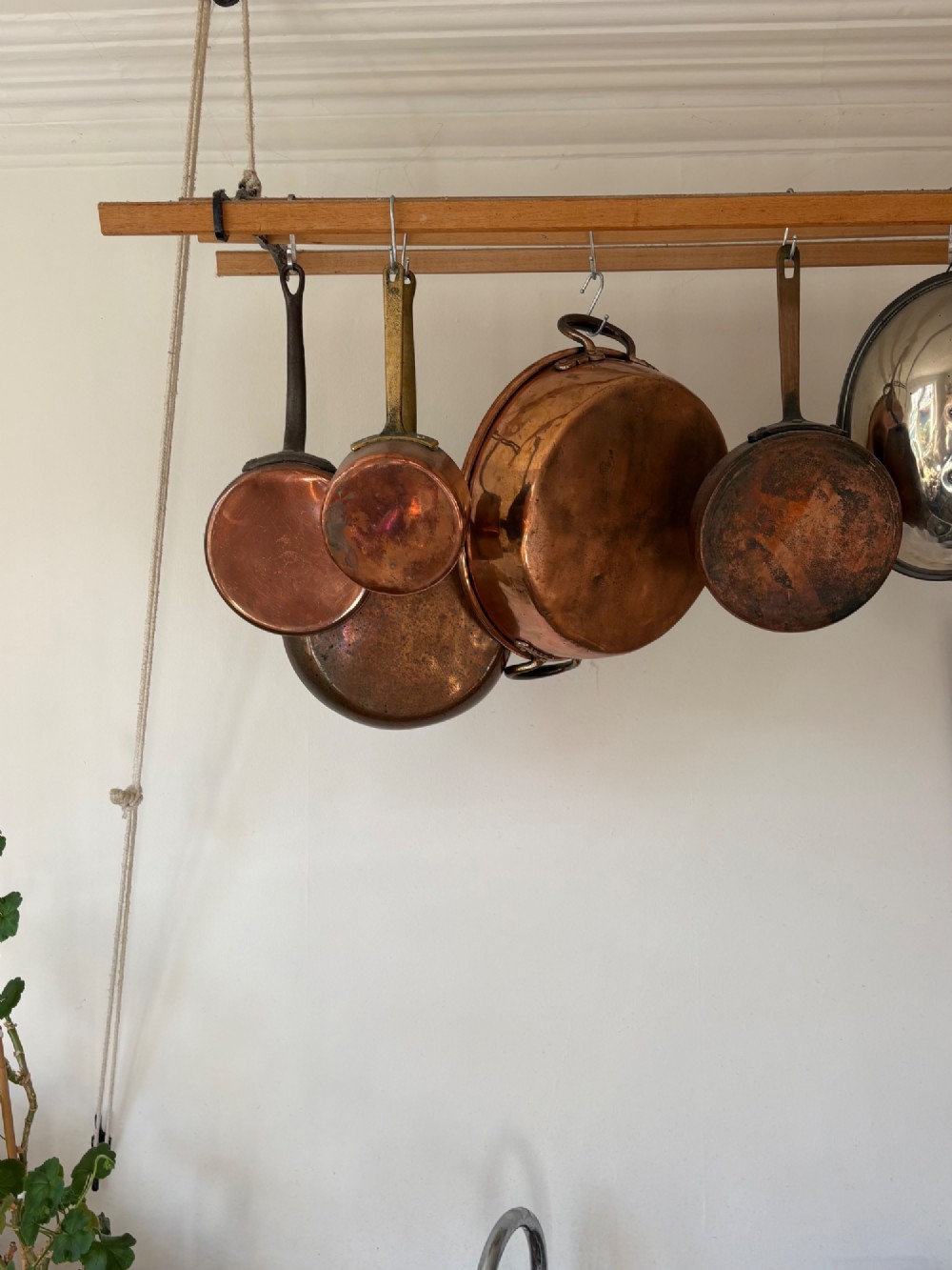 A large 19th-century polished copper preserve pan featuring twin riveted brass handles. View XI