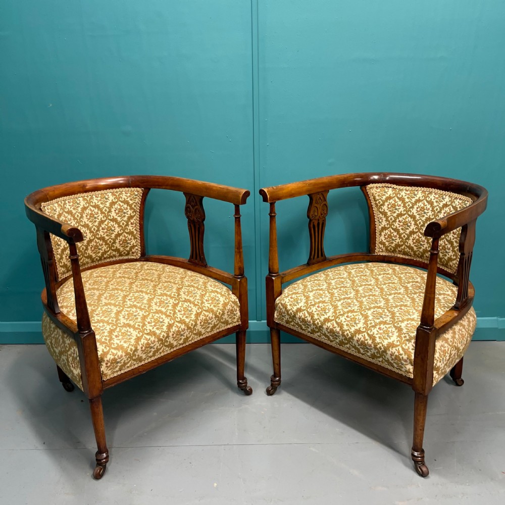 Pair of Edwardian mahogany tub armchairs on castors View IX