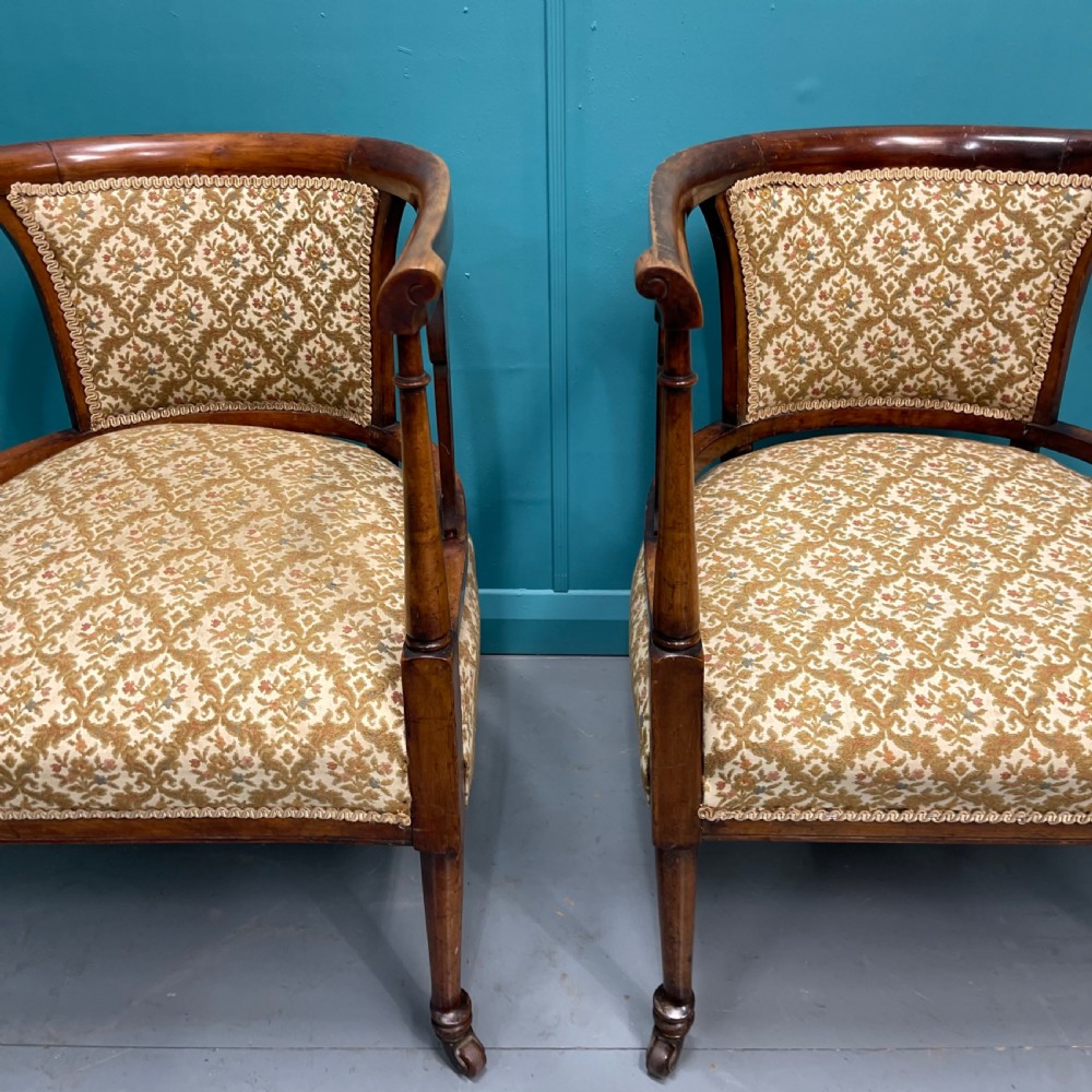 Pair of Edwardian mahogany tub armchairs on castors View VIII