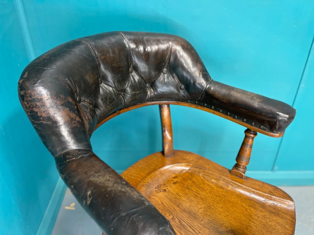 Victorian leather back desk chair with crinoline stretcher View II
