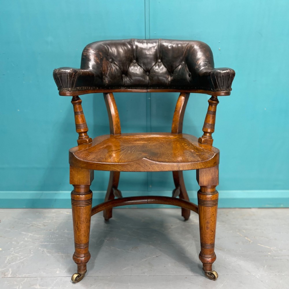 Victorian leather back desk chair with crinoline stretcher View IV