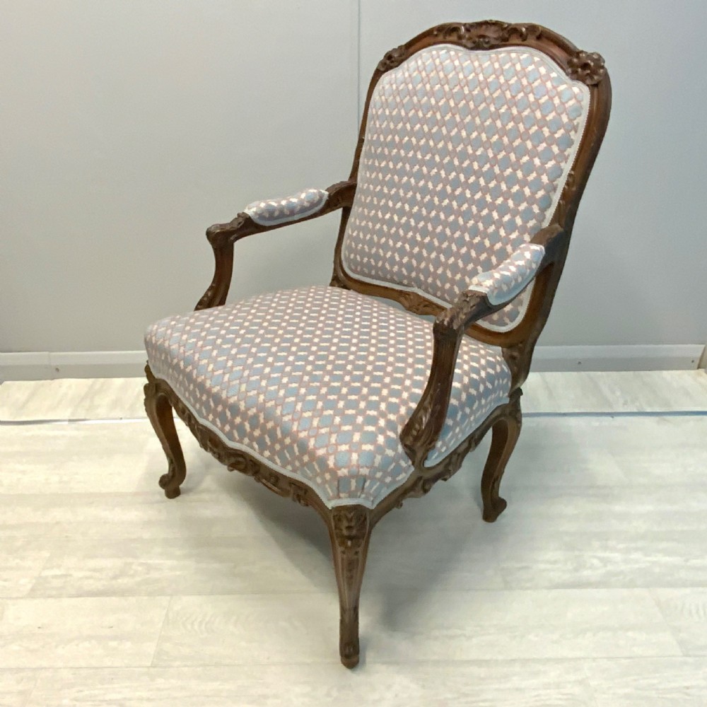 Very near pair of French walnut open armchairs View IV