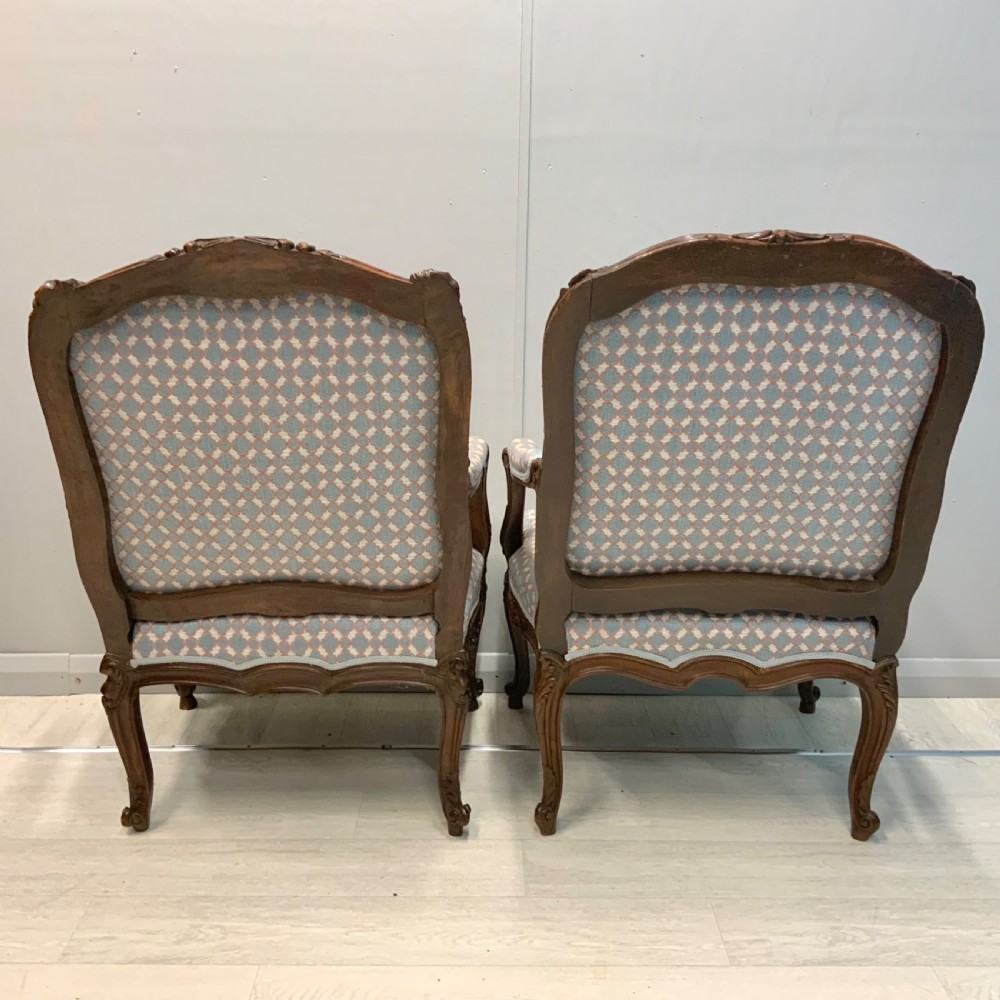 Very near pair of French walnut open armchairs View VII