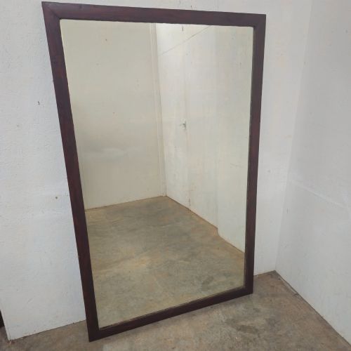 fig 2. A large 19th-century rectangular full-length mirror with a dark-stained pine frame.