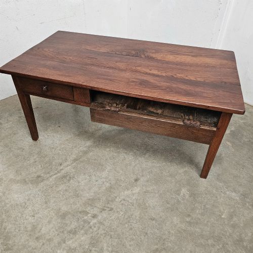 fig 1. A low rectangular dark oak table featuring a front drawer, a drop-front bread flap storage compartment, and square tapered legs.