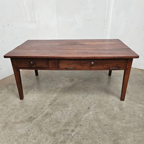 fig 2. A low rectangular dark oak table featuring a front drawer, a drop-front bread flap storage compartment, and square tapered legs.