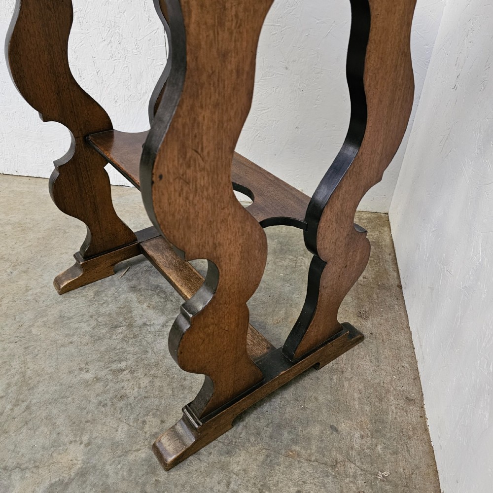 A French 19th-century walnut and ebonised stand featuring an inset marble top, a single frieze drawer, shaped supports, and a lower shelf. View V